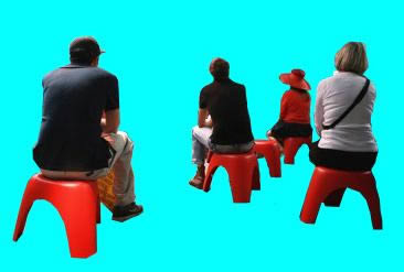 People sitting on stools